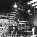 What Are the Benefits of Using Mobile Access Ladders in Warehouses