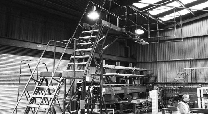 What Are the Benefits of Using Mobile Access Ladders in Warehouses